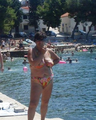 Women With Saggy Tits In Swimsuit.