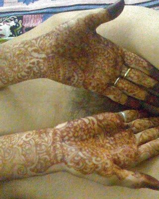 Indian Newly Wife With Mehndi On Hands