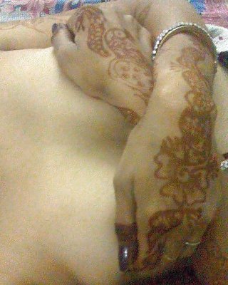 Indian Newly Wife With Mehndi On Hands