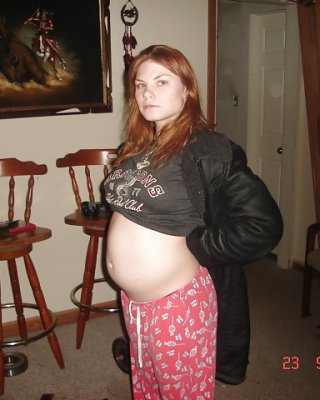 Pregnant Chick Flashes Her Tits And Belly