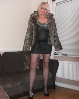 Slutty MILF In High Heels And Stockings By DarKKo