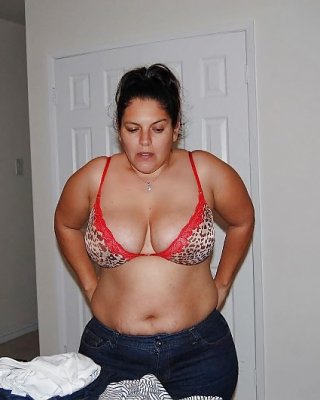 Latina Taking Off Bra