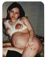 Pregnant Brunette Posing Her Lovely Belly