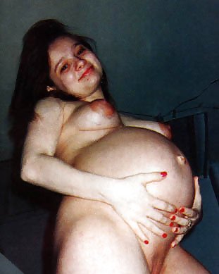 Pregnant Brunette Posing Her Lovely Belly