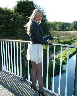 Non Nude Outdoor Posing From A Tremendous Blondie In A Tight Skirt Erin