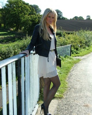 Non Nude Outdoor Posing From A Tremendous Blondie In A Tight Skirt Erin