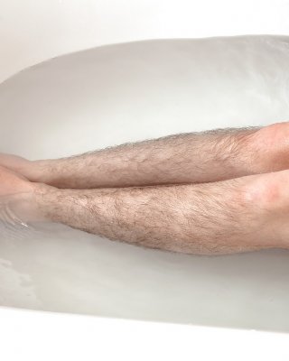 Hirsute Mature Broad Displaying Hairy Legs And Tiny Tits In Bathtub