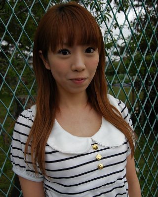 Asian Chihiro Ozawa Is Walking In Her Sexy Striped Dress Outdoors