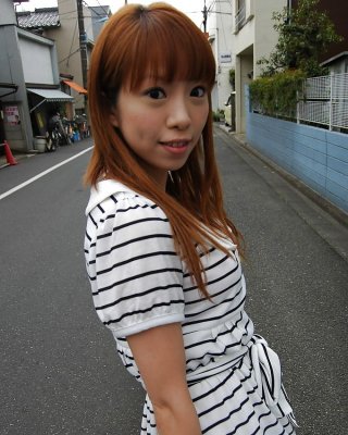 Asian Chihiro Ozawa Is Walking In Her Sexy Striped Dress Outdoors