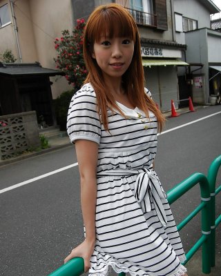 Asian Chihiro Ozawa Is Walking In Her Sexy Striped Dress Outdoors