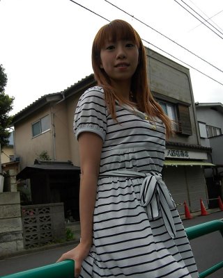 Asian Chihiro Ozawa Is Walking In Her Sexy Striped Dress Outdoors