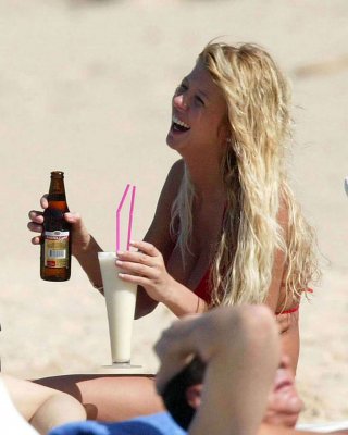 Tara Reid Exposing Her Sexy Body And Huge Tits In Bikini On Beach