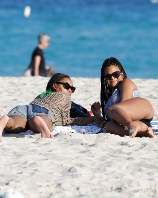 Christina Milian exposing nipples slip in bikini on beach #75229794