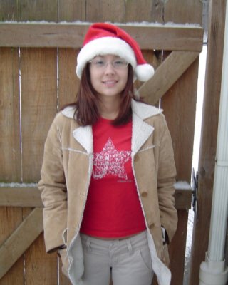 Asian Teen Wearing Santa Hat