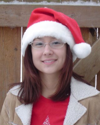 Asian Teen Wearing Santa Hat