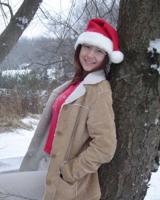 Asian Teen Wearing Santa Hat