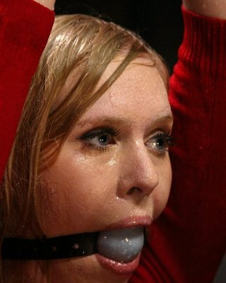 Sensual Sarah Jane blonde in red rope bondage with water tortureshot