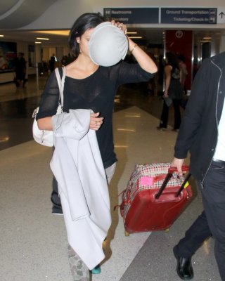 Morena Baccarin see through to bra at LAX airport #75182026