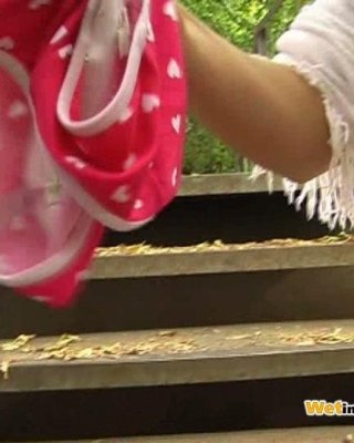 Pink Mini Skirt And Panties Of A Fair Woman Pissed On The Park Stairs