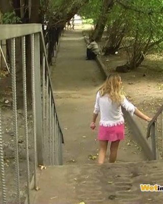 Pink Mini Skirt And Panties Of A Fair Woman Pissed On The Park Stairs