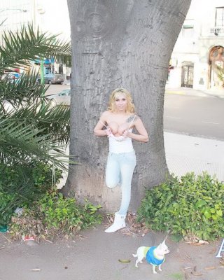 Gorgeous Shemale Posing Outdoors And Exposing Her Tits In Public And Shows Us Wh