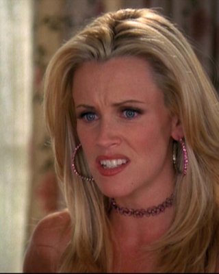 Jenny mccarthy lutscht eine Banane und sieht sexy aus im schwarzen Bikini
 #75312734