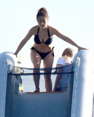 Salma Hayek Shows Off Her Big Boobs And Ass In Tiny Black Bikini At A Yacht In S