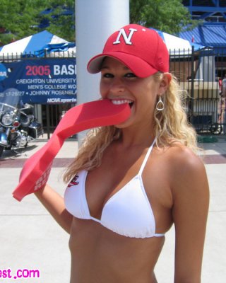 Melissa Midwest At The College World Series In A Nebraska Hat