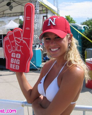 Melissa Midwest At The College World Series In A Nebraska Hat