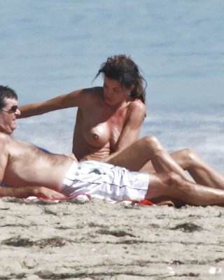 Janice Dickinson Showing Her Nice Big Tits On Beach Paparazzi Pictures