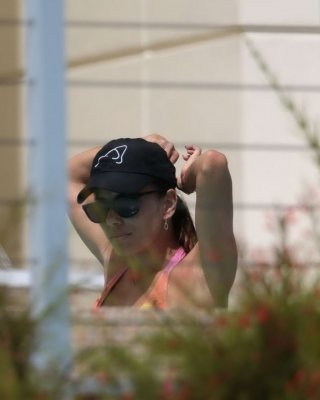 Eva Longoria Caught In A Tiny Colorful Bikini Poolside In Miami