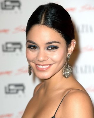 Vanessa Hudgens braless wearing a low cut maxi dress at Gimme Shelter premiere i #75182595