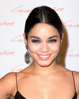 Vanessa Hudgens braless wearing a low cut maxi dress at Gimme Shelter premiere i #75182608