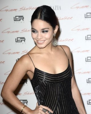 Vanessa Hudgens braless wearing a low cut maxi dress at Gimme Shelter premiere i #75182637