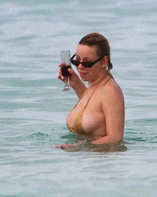 Mariah Carey Upskirt And Nipple Slip Paparazzi Pictures