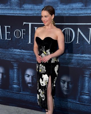 Emilia Clarke Shows Off Her Big Boobs In A Strapless Dress