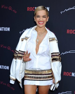 Busty Rita Ora braless wearing pasties under a wide open shirt at the Roc Nation #75206438