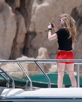 Avril Lavigne Exposing Sexy Bikini Body In Green Bikini On Yacht