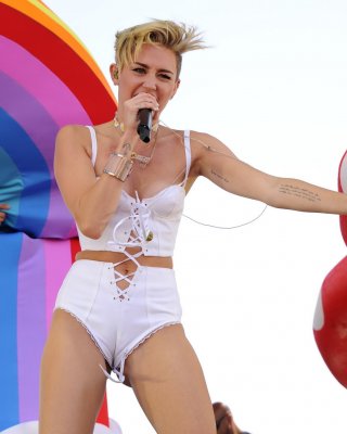 Miley Cyrus Showing Off Her Hot Body In A Tiny White Outfit At IHeart Radio Musi