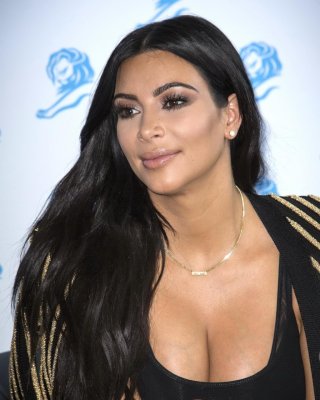 Kim Kardashian Showing Huge Cleavage At The Cannes Lions Event