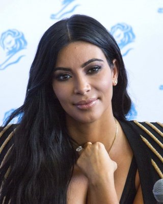 Kim Kardashian Showing Huge Cleavage At The Cannes Lions Event