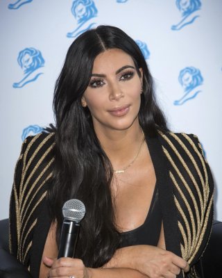 Kim Kardashian Showing Huge Cleavage At The Cannes Lions Event