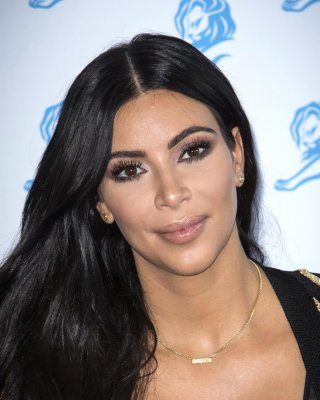 Kim Kardashian Showing Huge Cleavage At The Cannes Lions Event