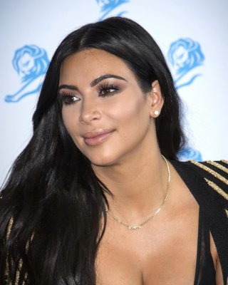 Kim Kardashian Showing Huge Cleavage At The Cannes Lions Event