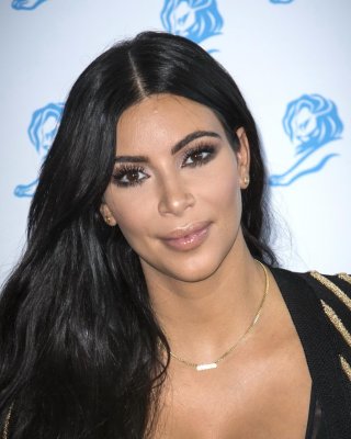 Kim Kardashian Showing Huge Cleavage At The Cannes Lions Event