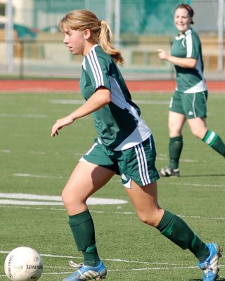 Teen girls playing soccer #78627135