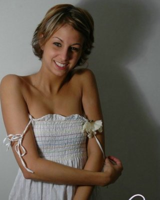 Cute Alyssa Posing And Teasing In A White Baby Doll Dress