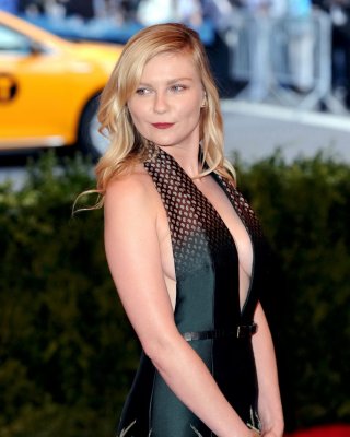 Braless Kirsten Dunst Showing Cleavage  Side Boob At The 2013 Met Gala In NYC