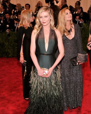 Braless Kirsten Dunst Showing Cleavage  Side Boob At The 2013 Met Gala In NYC