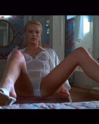 Charlize Theron Showing Ass In Shorts And Posing In Stockings